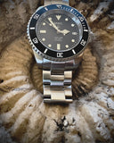 MWC 24 Jewel 300m Automatic Military Divers Watch with Sapphire Crystal and Ceramic Bezel on a Matching Stainless Steel Bracelet